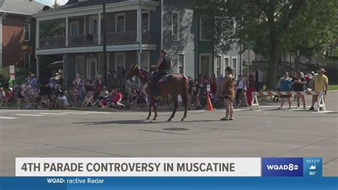Parade entry of woman in Native American dress pulled by a rope sows outrage, confusion